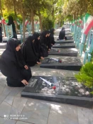 بمناسبت هفته دفاع مقدس مراسم غبار روبی و عطر افشانی مزارشهید محسن حججی و شهدای دفاع مقدس برگزار شد  4